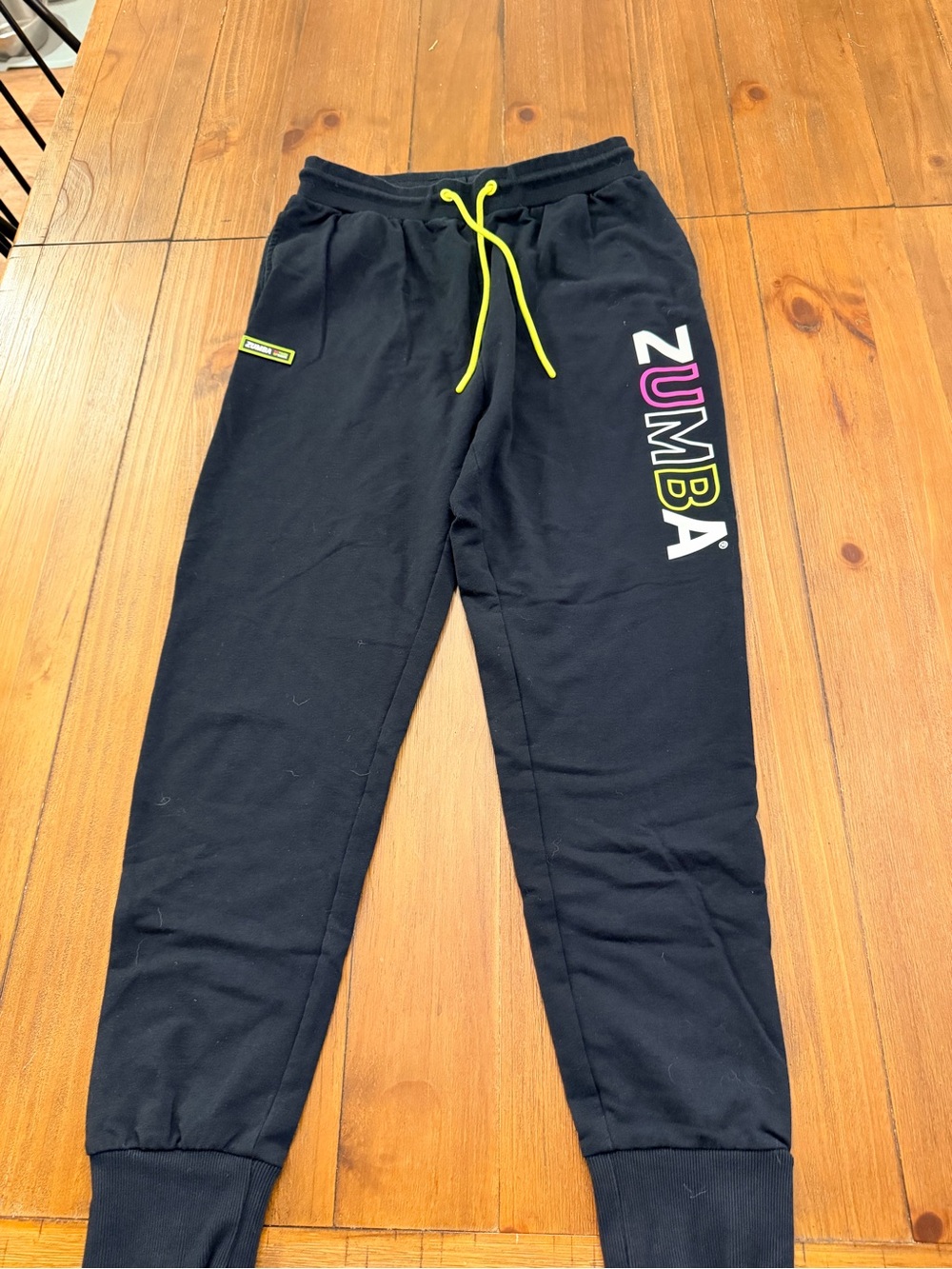 Zumba Fitness Black Joggers with Neon Yellow Drawstring and Multicolor Logo